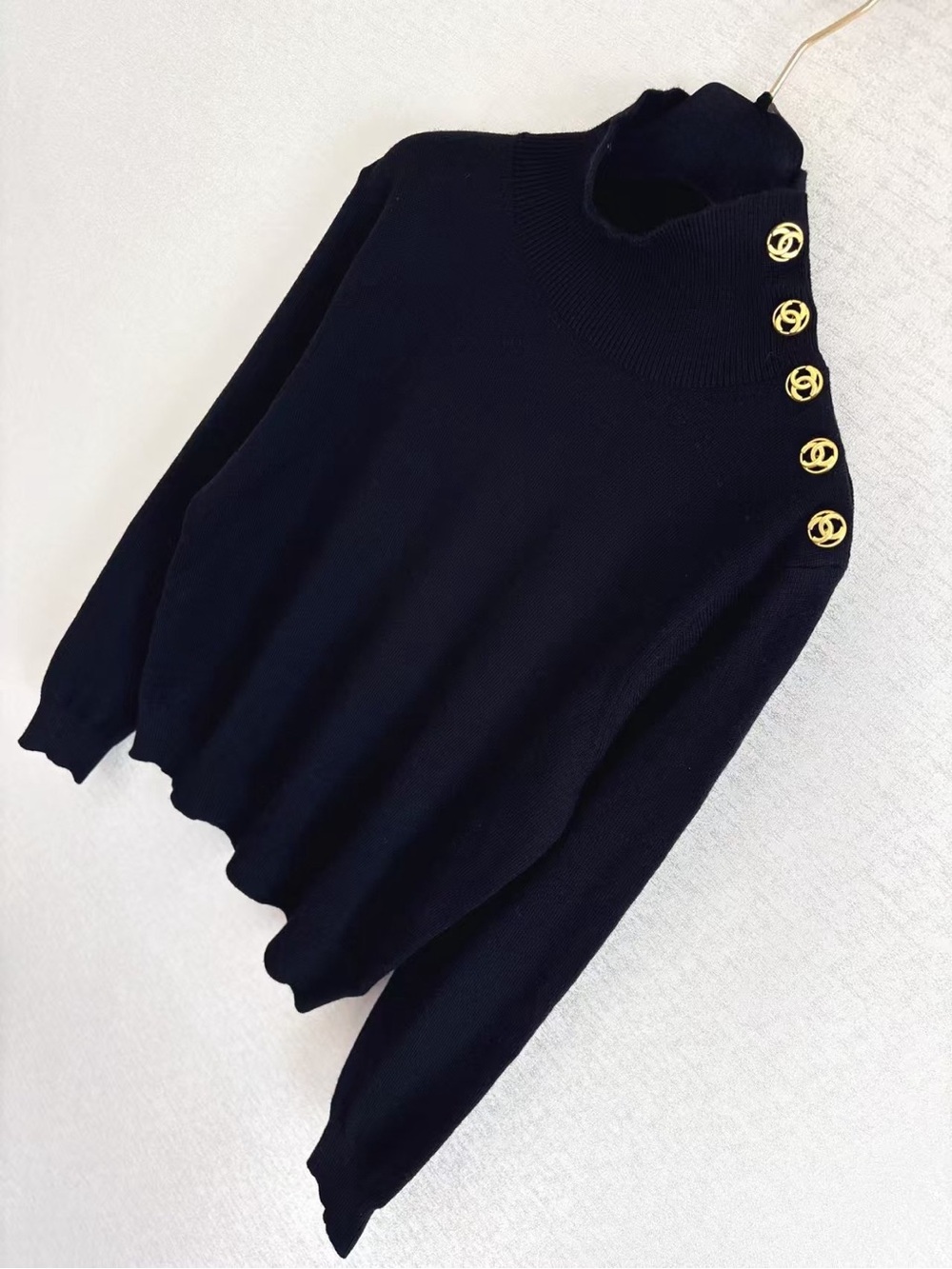 Classic Black Sweater with Decorative Gold Buttons